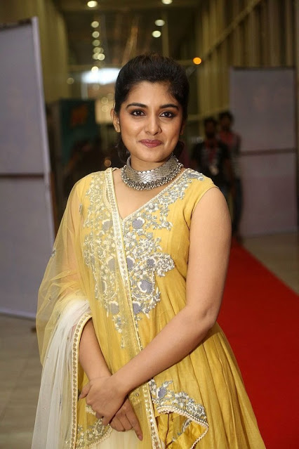 Telugu Girl Niveda Thomas Long Hair In Yellow Dress 22